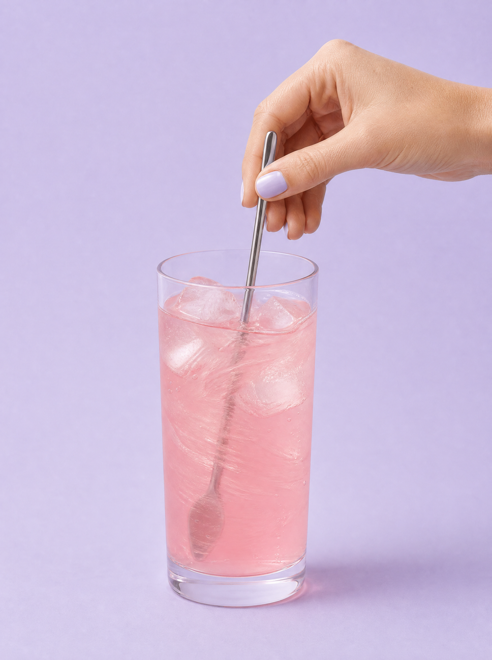 Rör ner i ett glas vatten